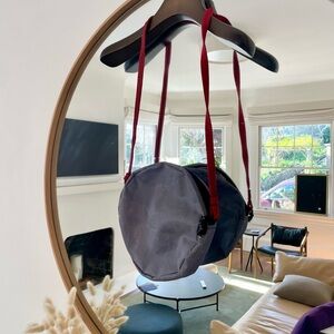 Gray and Red Round Bag